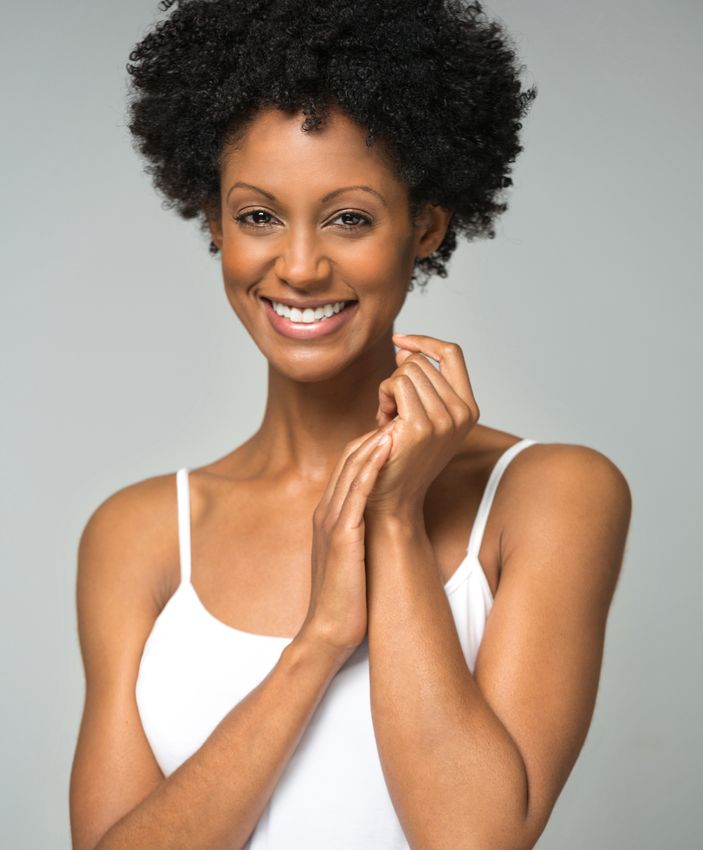 The Main Line emsculpt neo model with curly hair