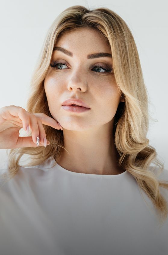 Woman with blonde hair and blue eyes