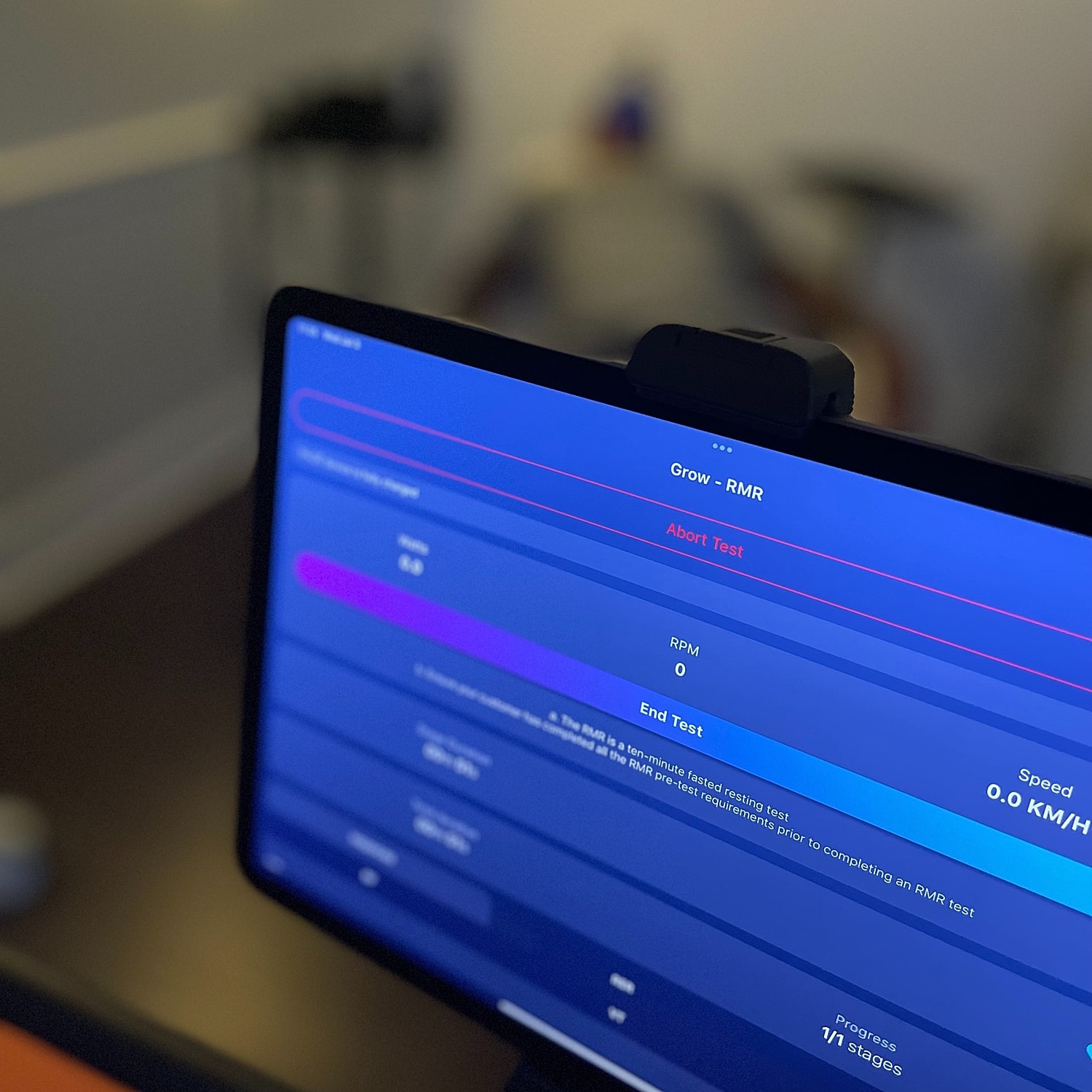 Person using a device in a dark setting.